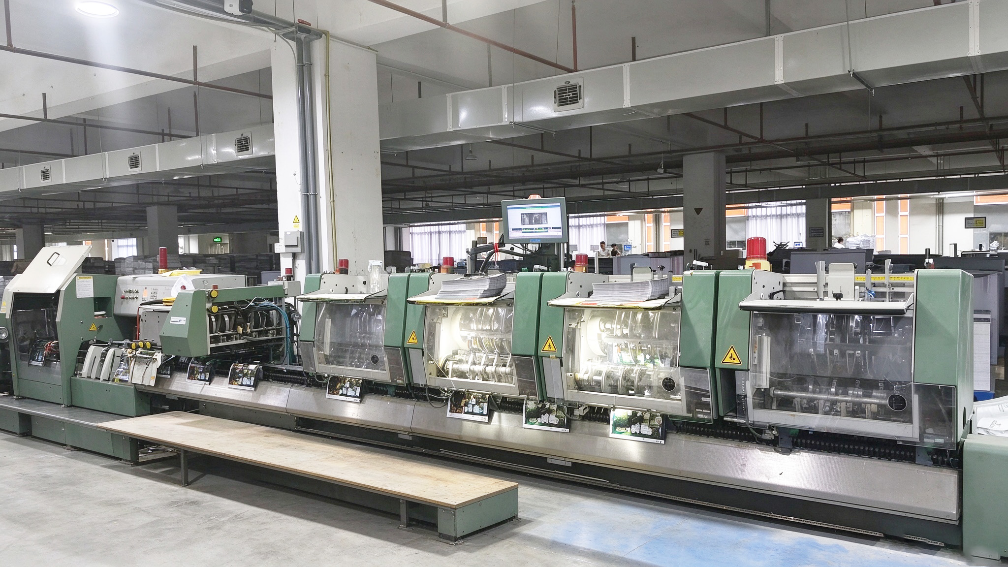 Swiss Müller Martini automatic saddle stitcher with inline gathering, stitching and trimming for magazines, brochures and thin children’s booklets.